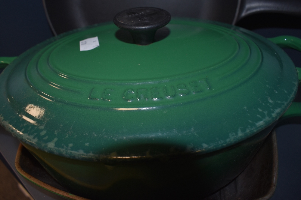 A Le Creuset green enamelled and lidded casserole dish, a griddle pan to match, two AGA frying pans, - Image 2 of 2