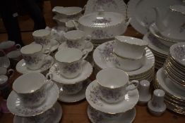 A large collection of Royal Stafford dinner service, having delicate lilac floral design and gilt