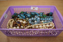 A collection of costume jewellery including synthetic pearl and turquoise coloured bead necklaces