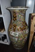 A 20th Century Chinese Famille Rose floor vase, of baluster form, decorated with panels of