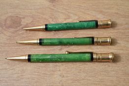 Three Parker Duofold propelling pencils in green all different sizes