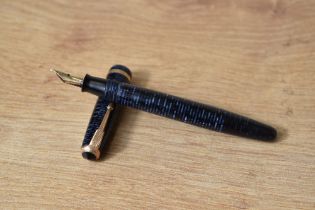 A Parker Vacumatic Junior Debutante fountain pen in blue with single band to the cap and Parker