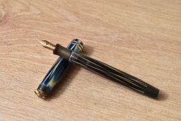 A Parker Lucky Curve True Blue button fill fountain pen with two bands to the ring cap having Parker