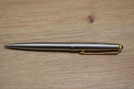 A Parker 45 ballpoint pen in chrome