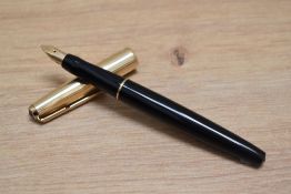 A Parker VP aero fill fountain pen in black with gold fill cap having Parker 14 USA 65 nib