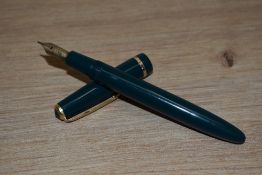 A Parker Duofold aero fill fountain pen in green with narrow decorative band to the cap having