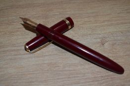 A Parker Maxima Duofold aero fill fountain pen in burgundy with broad decorative band to the cap