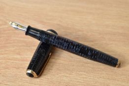 A Parker Vacumatic button fill fountain pen in blue with broad decorative band to cap and blue