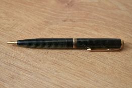 A Parker Vacumatic propelling pencil in green with three bands