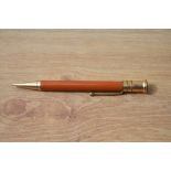 A Parker Duofold propelling pencil in red