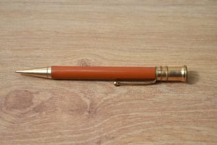 A Parker Duofold propelling pencil in red