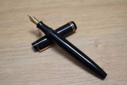 A Parker Victory button fill fountain pen in black with two narrow bands to the cap having Parker