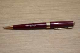 A Parker 17 Super propelling pencil in burgundy with broad band to the base of the cap