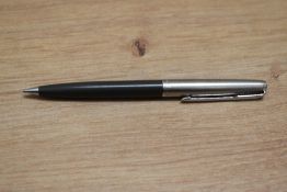 A Parker 65 propelling pencils in grey with chrome cap