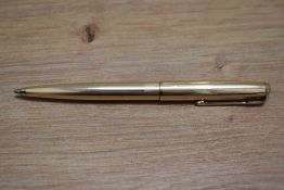 A Parker rolled gold ballpoint pen. Engraved