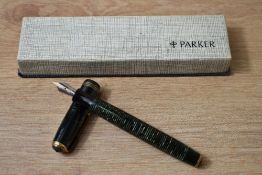 A Parker Standard Vacumatic fountain pen in green with three bands to the cap having Parker