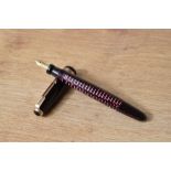 A Parker Major Standard Vacumatic in burgundy with decorative band to the cap having Parker
