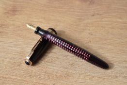 A Parker Major Standard Vacumatic in burgundy with decorative band to the cap having Parker