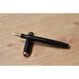 A Parker Vacumatic fountain pen in black with three narrow bands to the cap having Parker Duofold