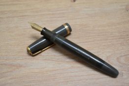 A Parker Duofold button fill fountain pen in grey with decorative band to the cap having Parker