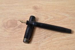 A Parker Ladies button fill fountain pen in chaised BHR having Parker 3 nib made in Canada