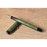A Parker Duofold Junior button fill fountain pen in green herringbone with single band to the cap