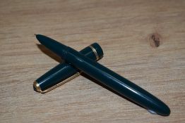 A Parker Duofold Lady aero fill fountain pen in green with narrow decorative band to the cap. Boxed