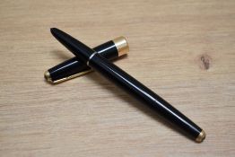 A Parker 17 aero fill fountain pen in black with broad band to base of the cap