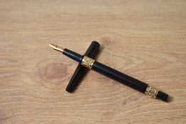 A Parker Lucky Curve Eyedropper fountain pen in BHR with two decorative gold bands to the barrel and
