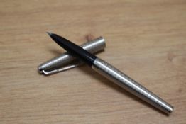 A Parker 45 Harlequin Circlet cartridge fountain pen in grey. Clip slightly stretched