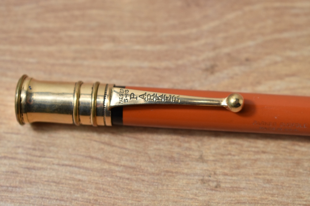 A Parker Duofold propelling pencil in red with black band to top and bottom of the barrel - Image 2 of 3