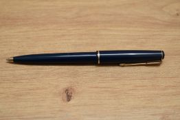 A Parker 17 ballpoint pen in blue with narrow band to the cap