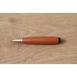 A Parker Duofold Vest Pocket propelling pencil in red. Missing ring from ring top