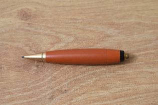 A Parker Duofold Vest Pocket propelling pencil in red. Missing ring from ring top