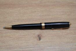 A Parker Duofold propelling pencil in black with broad decorative band