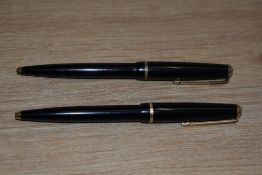 Two Parker Duofold ballpoint pens in black with narrow decorative band
