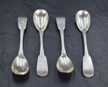 A group of four George III Irish silver fiddle pattern condiment spoons, with ovoid bowls and
