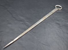 A George III silver meat skewer, of traditional tapering form with ring terminal, marks for London