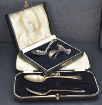A cased George VI silver babies feeding spoon and pusher, marks for Birmingham 1936, maker Adie