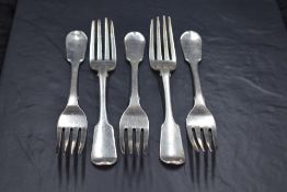A group of five George IV silver Hanoverian fiddle pattern dinner forks, engraved with initial C