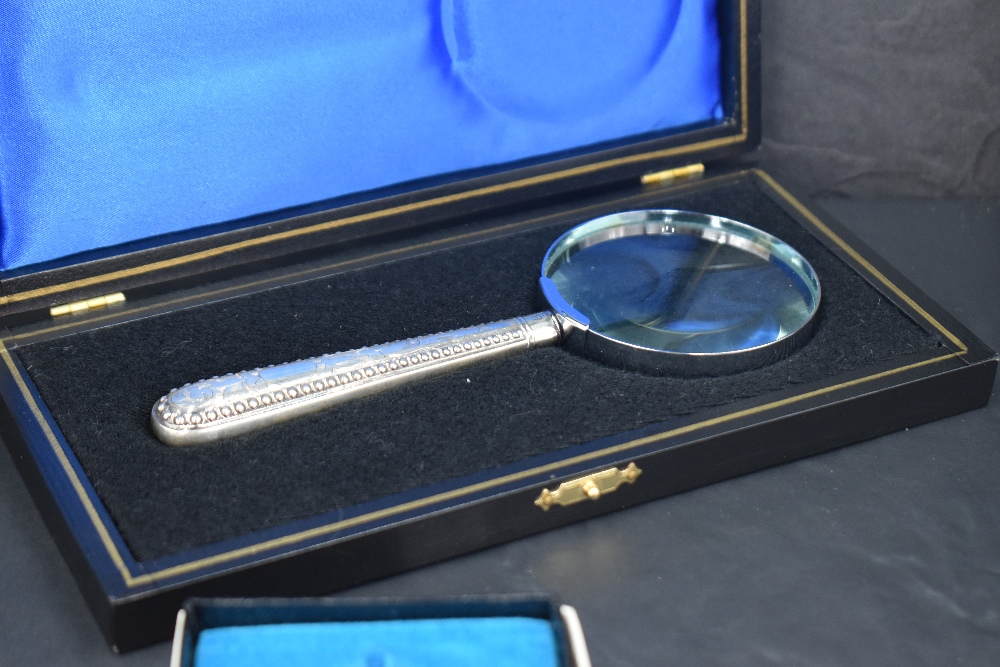 A Victorian silver handled magnifying glass, the bead-moulded and engraved handle with rubbed - Image 2 of 2