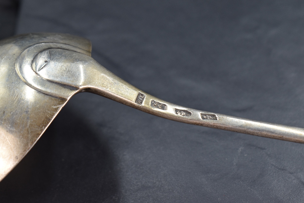 An early George III silver Hanoverian pattern ladle, the dished circular bowl issuing the long - Image 3 of 3