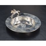 A Queen Elizabeth II silver dish, of circular form, the broad plain rim with racehorse ornament