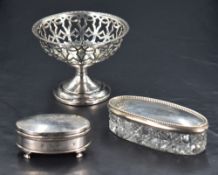A George V silver pedestal dish, of circular form, pierced with repeating design and raised on a