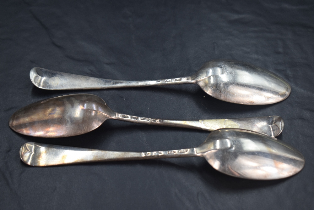 Three George II silver Old English pattern table spoons, the terminals engraved with crest 'A Dexter - Image 2 of 5