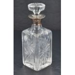 A Queen Elizabeth II silver mounted cut-crystal decanter, of square outline with circular star-cut