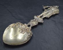 A late Victorian/Edwardian imported ornamental Hanau silver spoon, the heart shaped shallow bowl