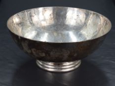A Queen Elizabeth II silver bowl, of dished and planished circular form with short reed moulded