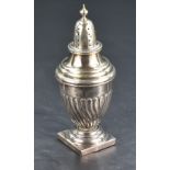A late Victorian silver sugar caster, of traditional urn form with pierced finial topped cover