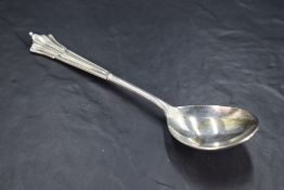 An Edwardian silver Albany pattern spoon, of good size with nicely presented drop, marks for